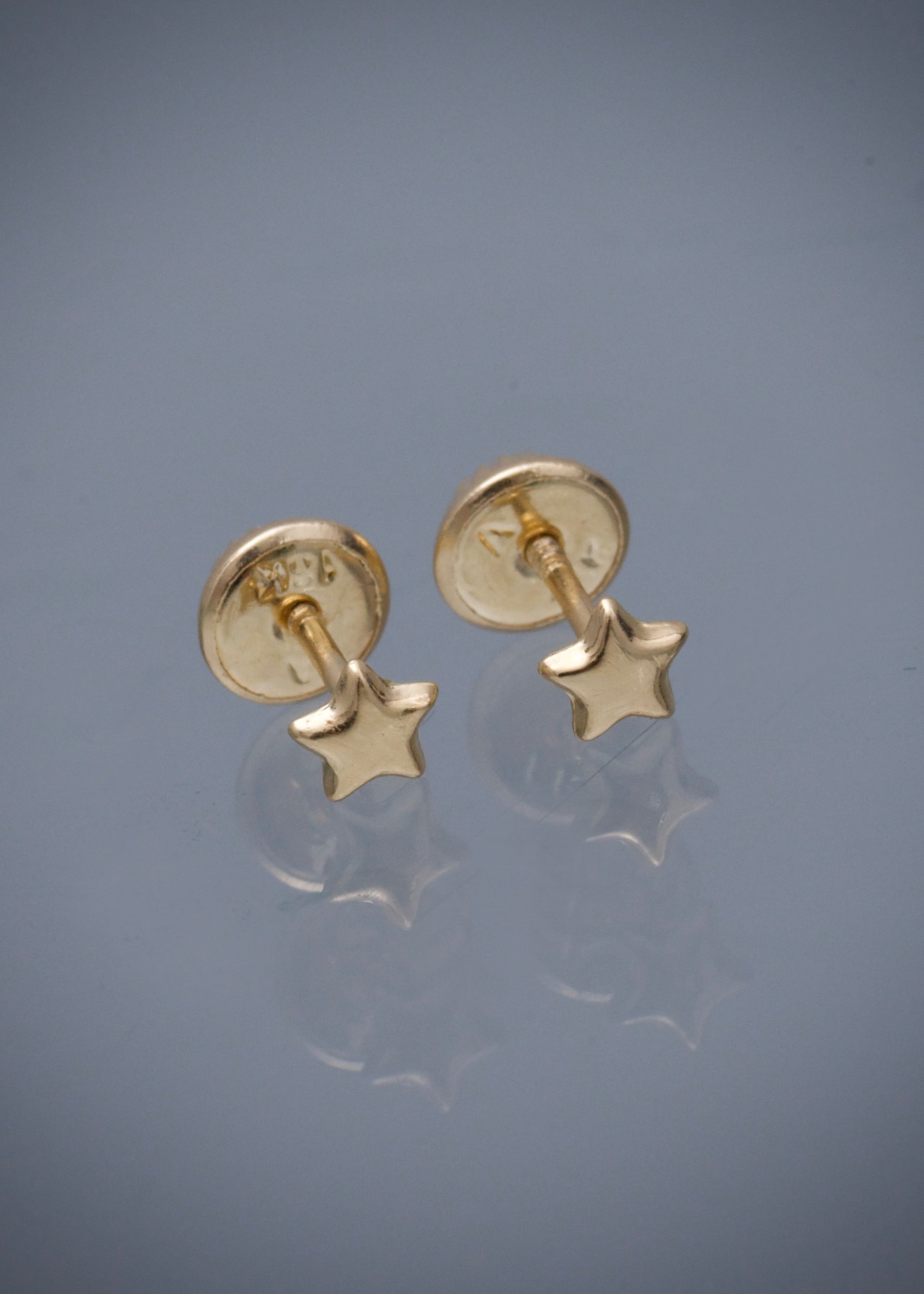 Topos estrella 0.4gr / Largo 0.3cm / Oro Amarillo Nac M