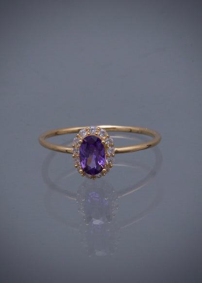 Solitario con swarovski morado y blanco 1.3gr / TALLA 5 1/2 / Oro Amarillo Nac*