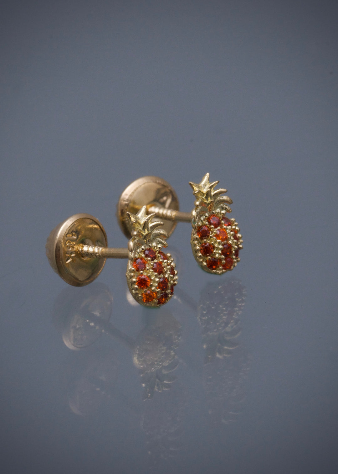 Topos piña con swarovski naranja 0.85gr / Largo 0.76cm — Oro Amarillo