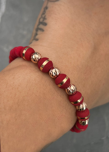 Pulsera en hilo rojo con bolas diamantadas 1.1gr / Oro Rosado (Joya) *