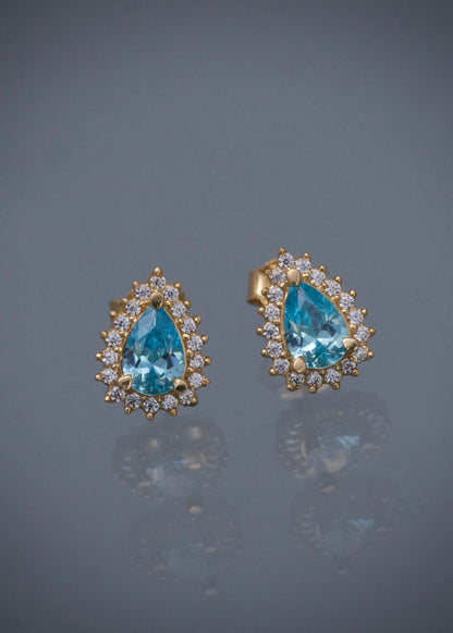 Topos gota con swarovski azul y blanco 2gr / Largo 1cm / Oro Amarillo Nac B