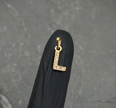 Dije letra L con swarovski blanco 0.55gr / Largo 1.5cm / Oro Amarillo Nac B