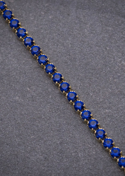 Pulso Tenis con Swarovski Azul 2.2gr / 19cm / 1.8mm — Oro Amarillo