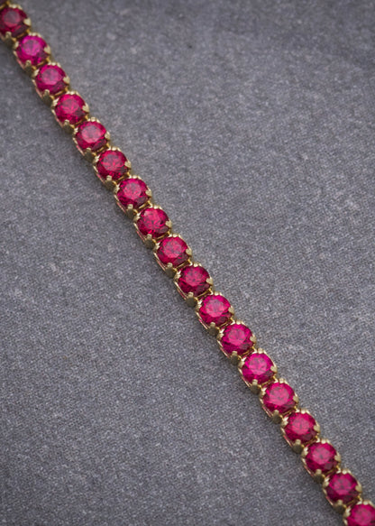 Pulso Tenis con Swarovski Fucsia 2.3gr / 18cm / 1.8mm — Oro Amarillo