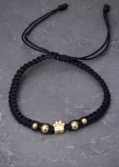Pulsera en Hilo Negro con Herraje Huella 0.5gr — Oro Amarillo