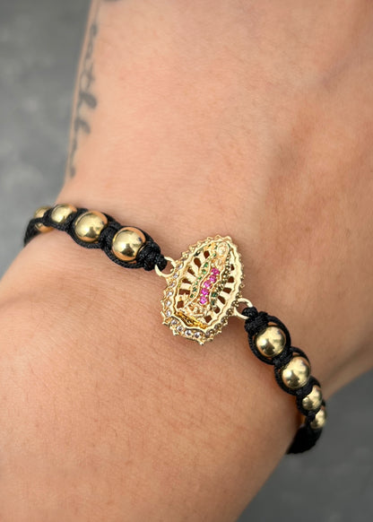 Pulsera en Hilo Negro con Herraje Virgen de Guadalupe 3.2gr — Oro Amarillo