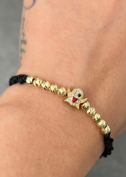 Pulsera en Hilo Negro con Herraje Emoji Fantasma 1.55gr — Oro Amarillo