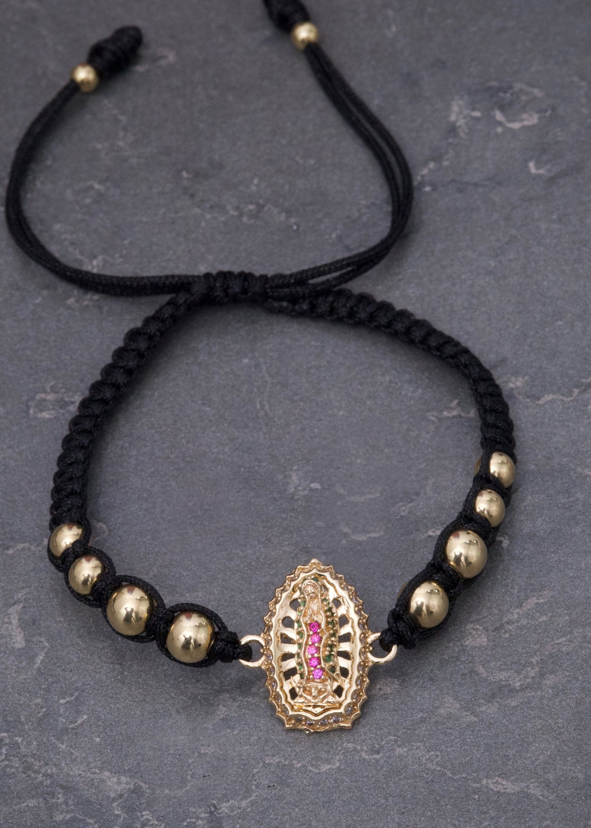 Pulsera en Hilo Negro con Herraje Virgen de Guadalupe 3.2gr — Oro Amarillo