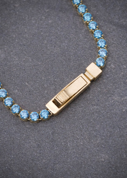 Pulso Tenis con Swarovski Azul 2.7gr / 19cm / 1.8mm — Oro Amarillo