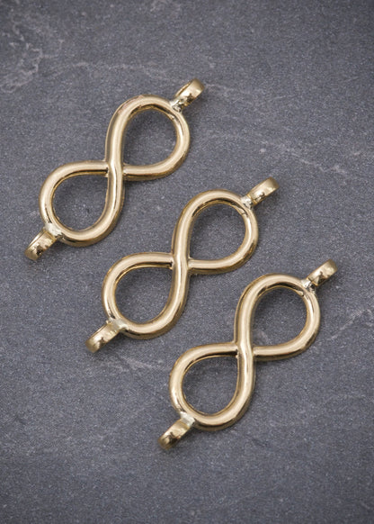 Herraje infinito 0.4gr / Largo 2.3cm / Oro Amarillo Nac B