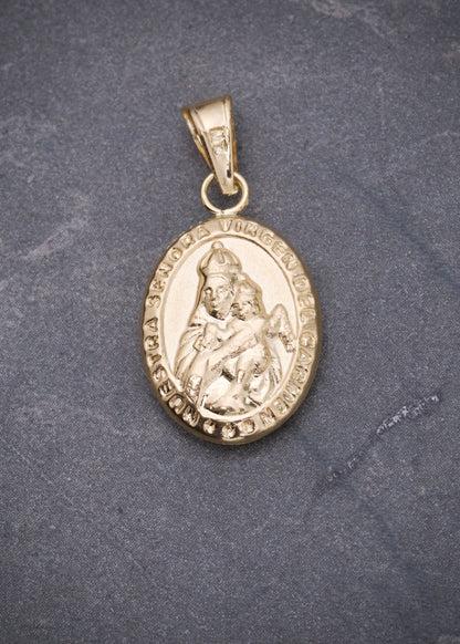 Dije virgen del carmen 1.05gr / Largo 2.4cm / Oro Amarillo Nac P