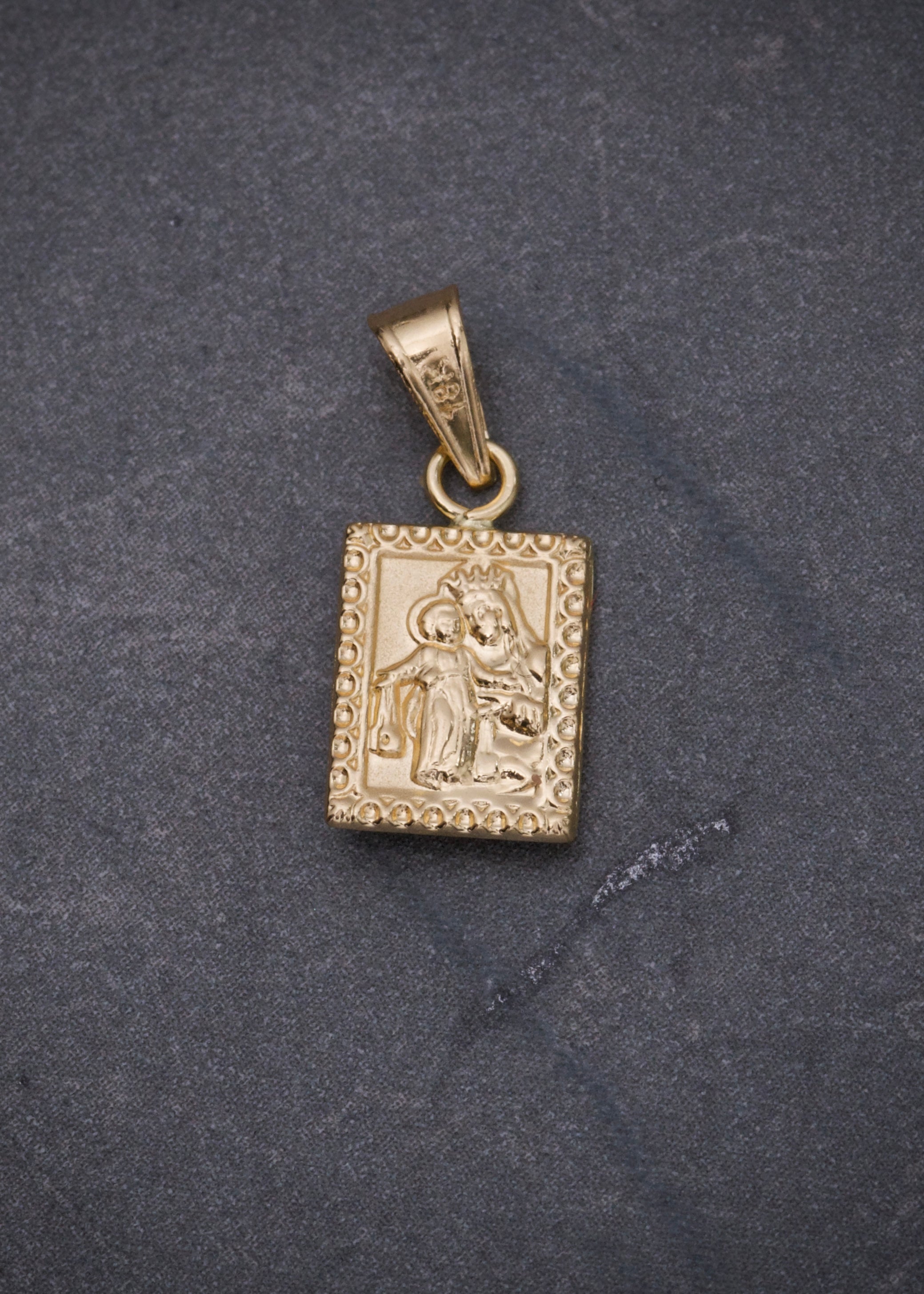 Dije corazon de jesus y virgen del carmen  0.5gr / Largo 1.7cm / Oro Amarillo Nac P