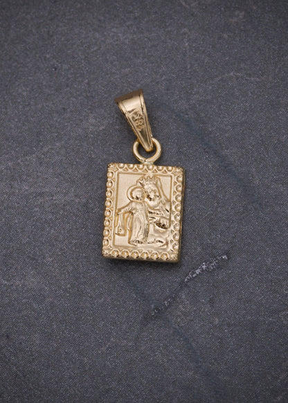 Dije corazon de jesus y virgen del carmen  0.5gr / Largo 1.7cm / Oro Amarillo Nac P