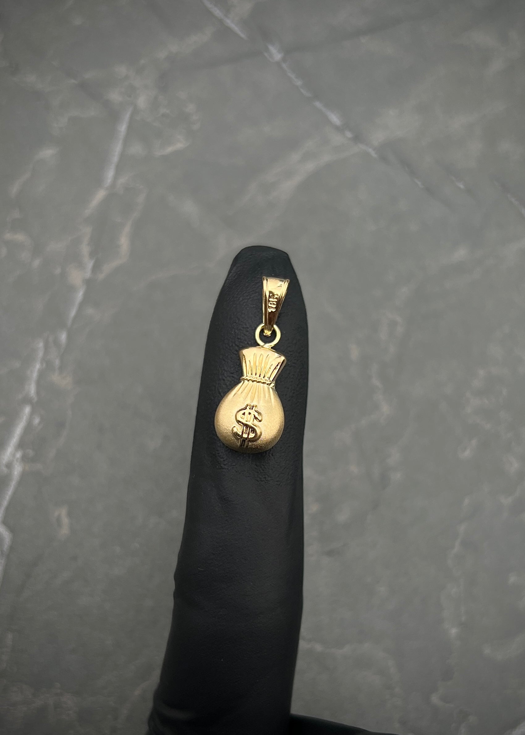 Dije Bolsa de dinero 0.75gr / Largo 2.2cm / Oro Amarillo Nac P