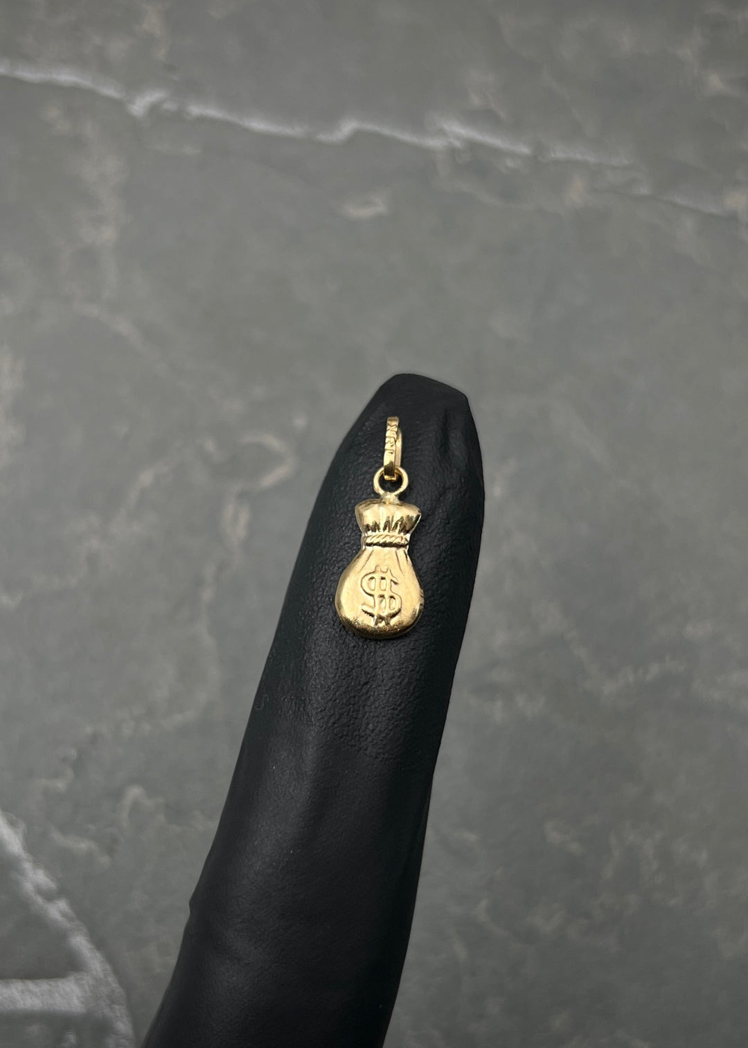 Dije bolsa de dinero 0.4gr / Largo 1.8cm — Oro Amarillo