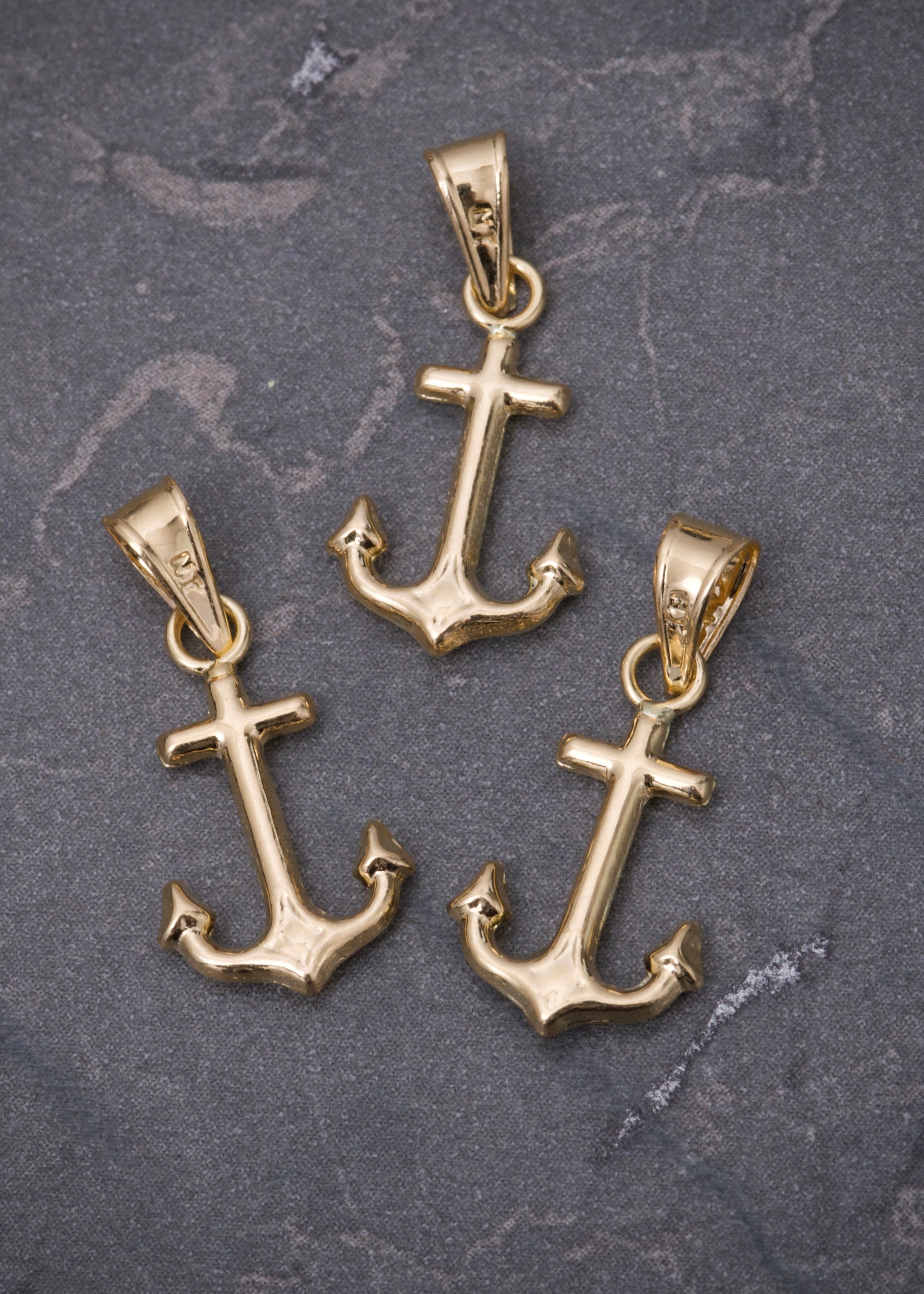 Dije de ancla 0.4gr / Largo 1.9cm / Oro Amarillo Nac B