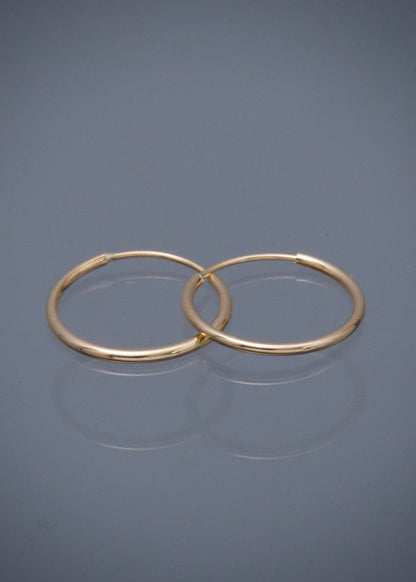 Candongas lisas 0.55gr / Largo 1.2cm — Oro Amarillo