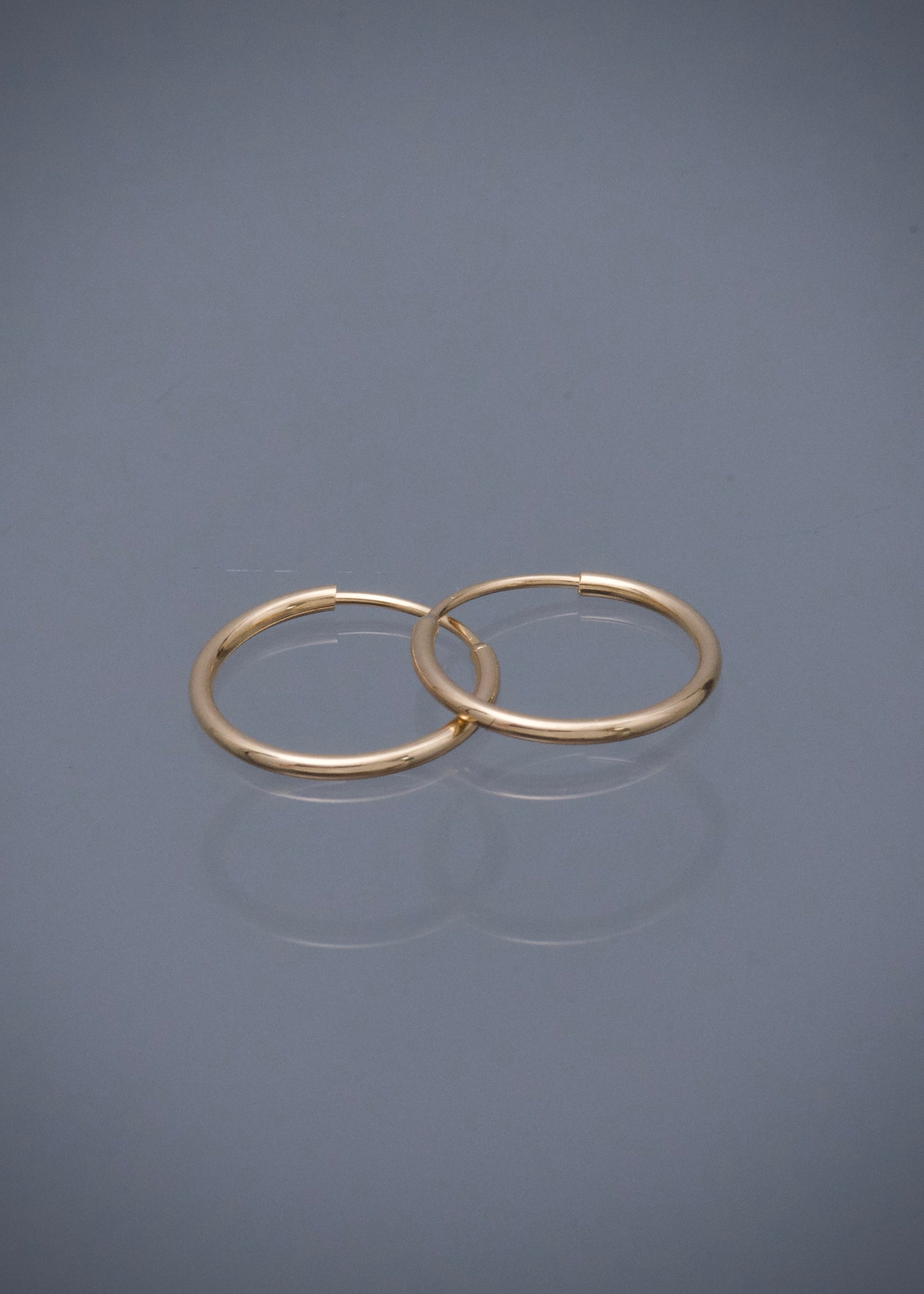 Candongas Lisas 0.5gr / 1.2cm / 1,1mm — Oro Amarillo