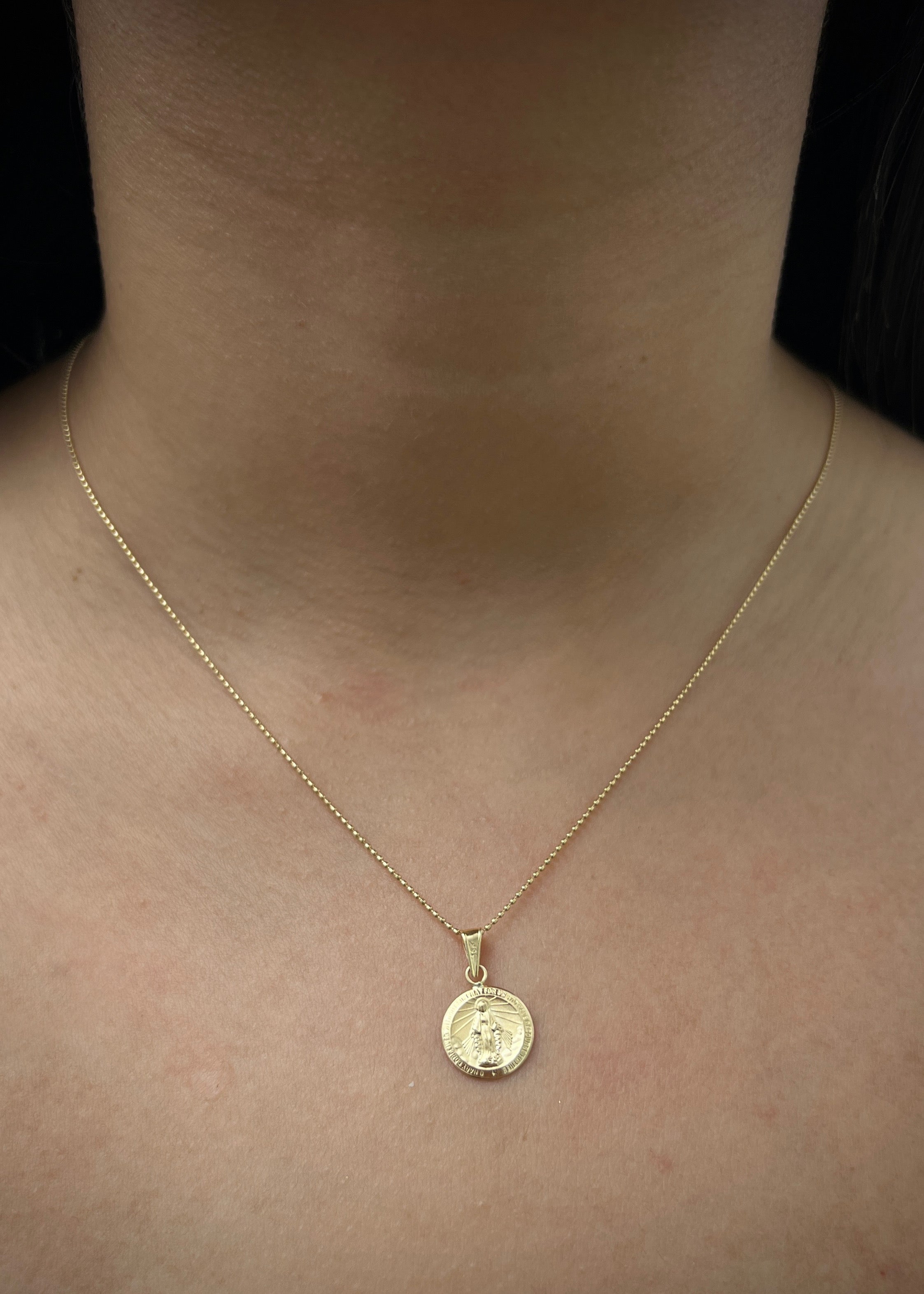 Dije Virgen de la milagrosa 0.7gr / Largo 1.9cm / Oro Amarillo Nac P