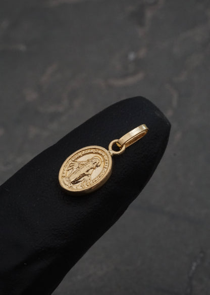 Dije virgen de la milagrosa 0.3gr / Largo 1.5cm / Oro Amarillo Nac B