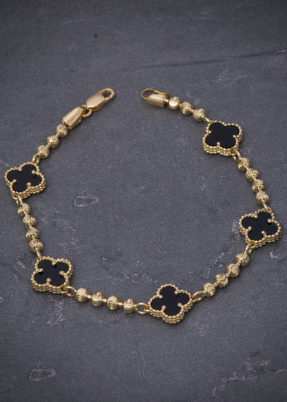 Pulso lucky clover piedra negra 7.8gr / Largo 17.5cm / Oro Amarillo Nac M