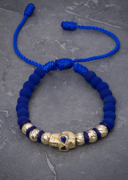 Pulsera en hilo azul con herraje de calavera 5.35gr / Oro Amarillo (Joya) P