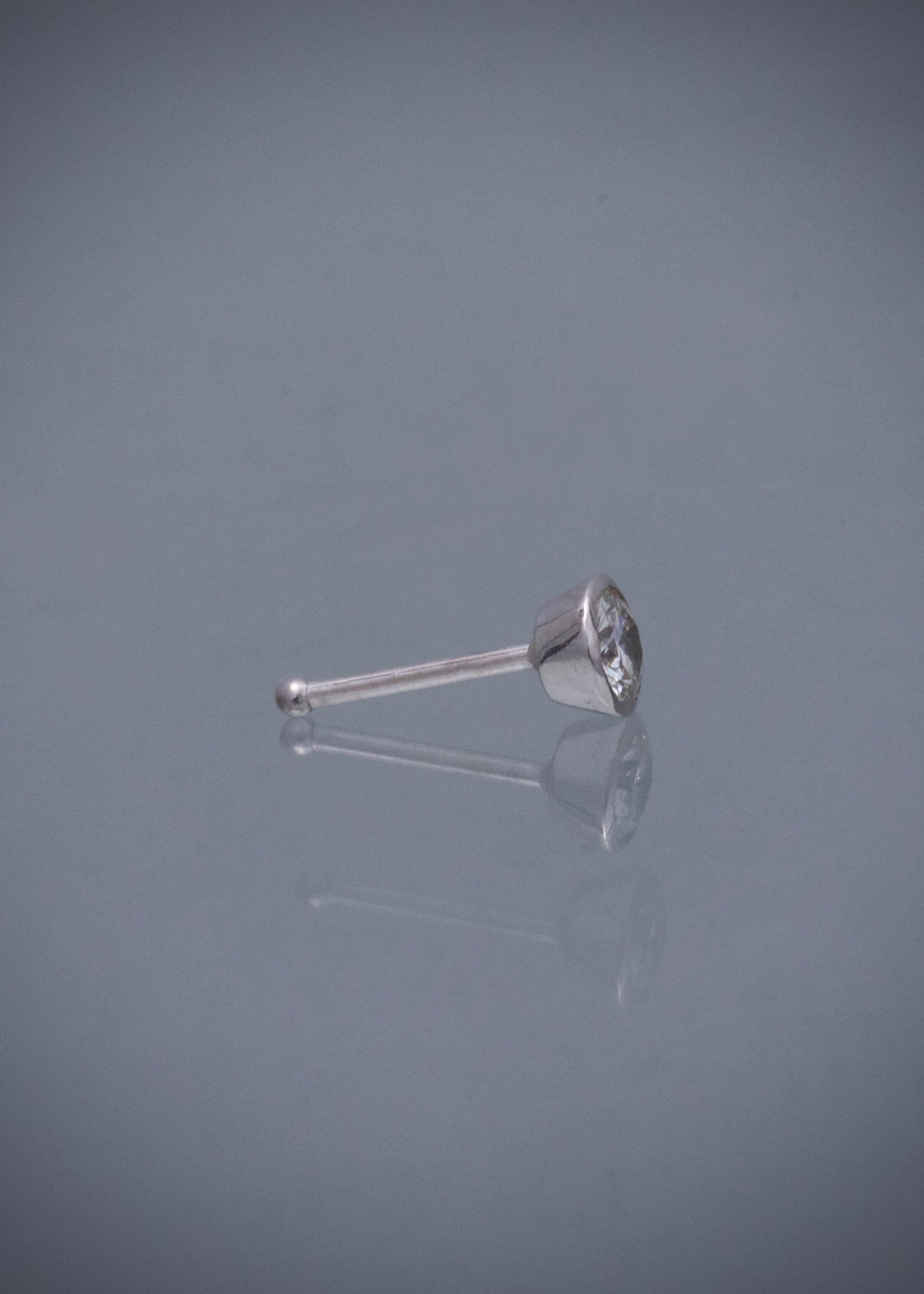 Piercing con 9pts de diamante 0.15gr — Oro Blanco