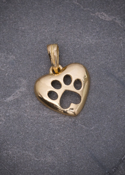 Dije huella de perro 1.35gr / Largo 1.6cm / Oro Amarillo Nac M