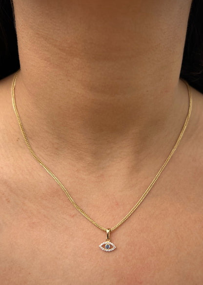 Dije ojo turco con swarovski azul y blanco 0.55gr / Largo 1.2cm / Oro Amarillo Nac B