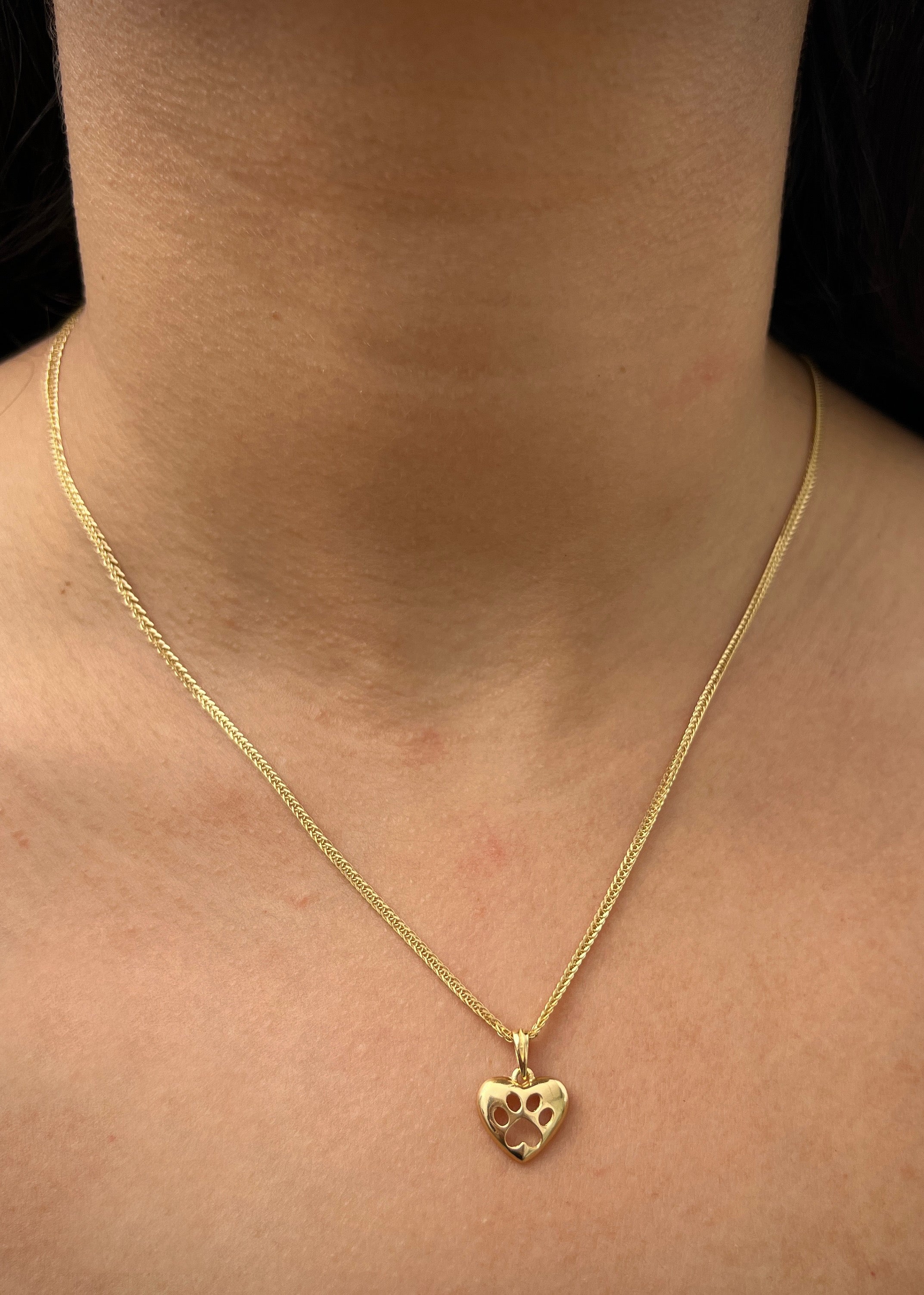 Dije huella de perro 1.4gr / Largo 1.6cm / Oro Amarillo Nac B