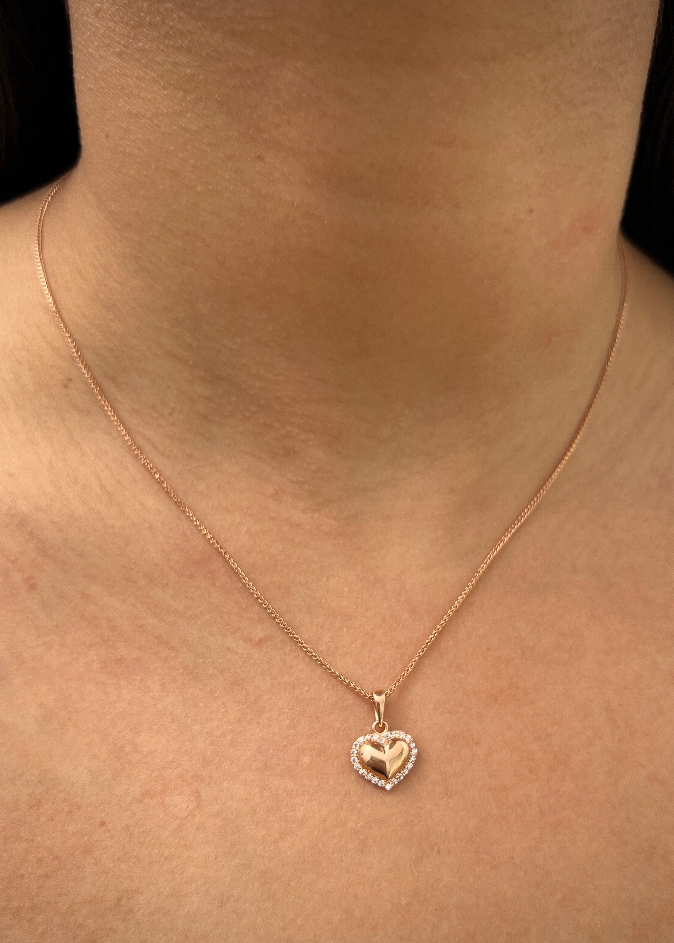 Dije corazon con swarovski blanco 1.25gr / Largo 1.6cm / Oro Rosado Nac B