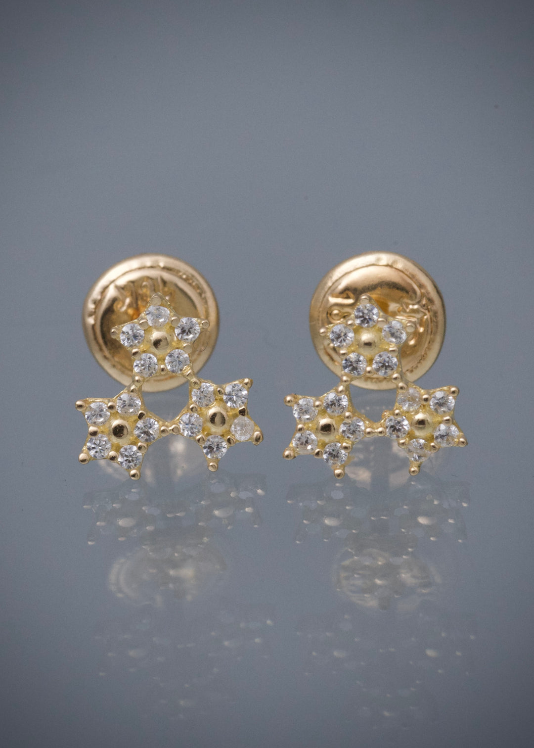 Topos flores con swarovski blanco 0.85gr / Largo 0.7cm — Oro Amarillo
