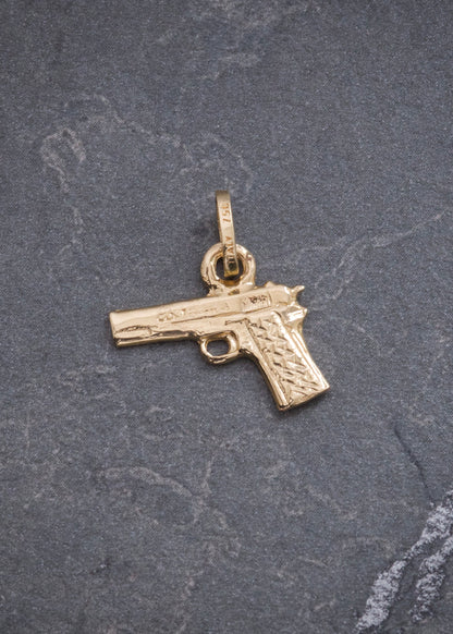 Dije Pistola 1.4gr / 1.8cm / 15.5mm — Oro Amarillo