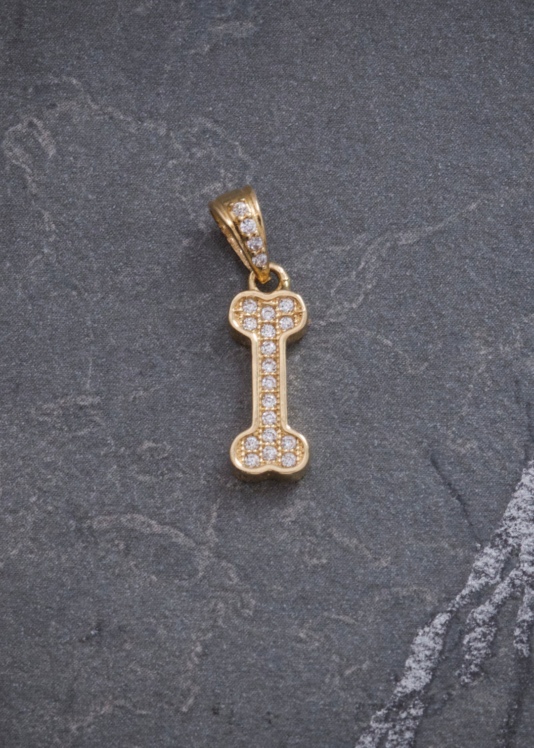 Dije Hueso con Swarovski Blanco 1.15gr / 2cm / 5.4mm — Oro Amarillo