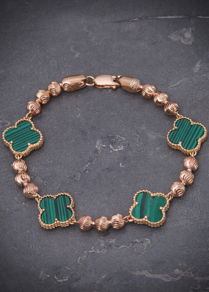 Pulso lucky clover piedra verde 13.35gr / Largo 19cm / Oro Rosado Nac B