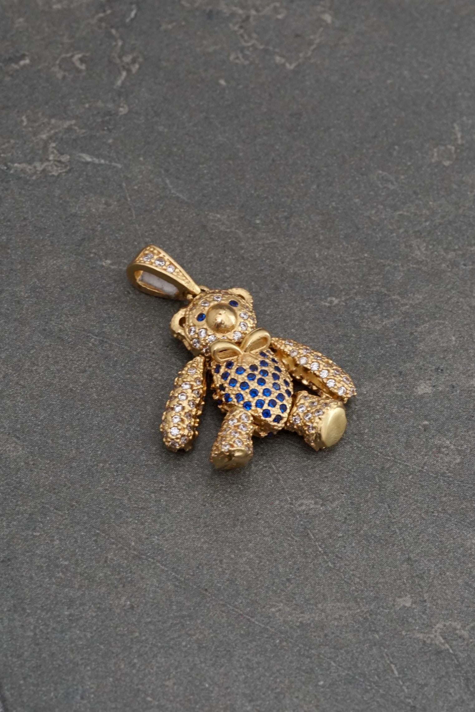 Dije articulado con swarovski azul y blanco 7.3gr / Largo 3cm / Oro Amarillo Nac P