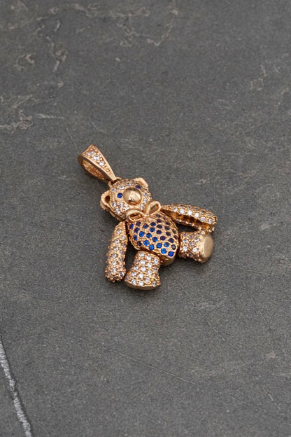 Dije articulado con swarovski azul y blanco 7.5gr / Largo 3cm / Oro Rosado Nac P