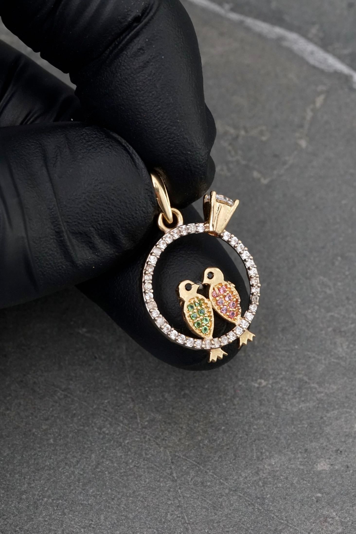 Dije pajaros con swarovski 2.15gr / Largo 2.5cm / Oro Amarillo Nac P