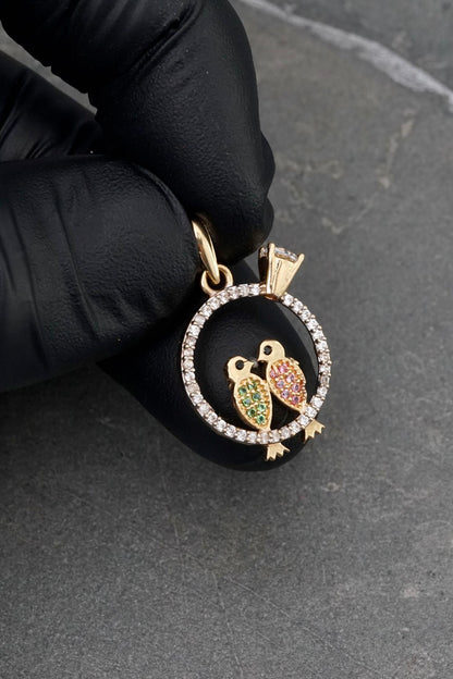 Dije pajaros con swarovski 2.15gr / Largo 2.5cm / Oro Amarillo Nac P