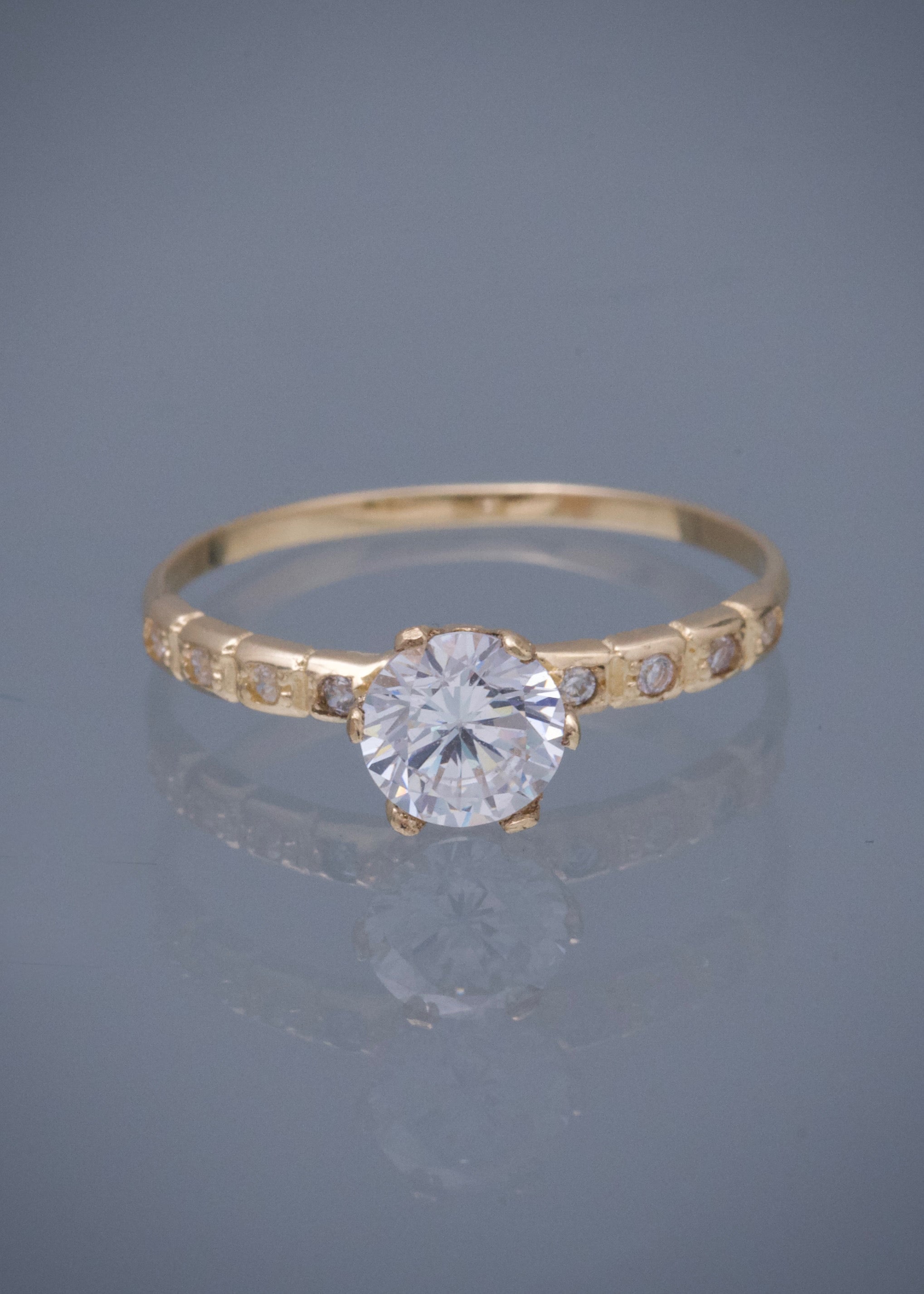 Solitario con swarovski blanco 1.75gr / TALLA 7 1/4 / Oro Amarillo Nac M