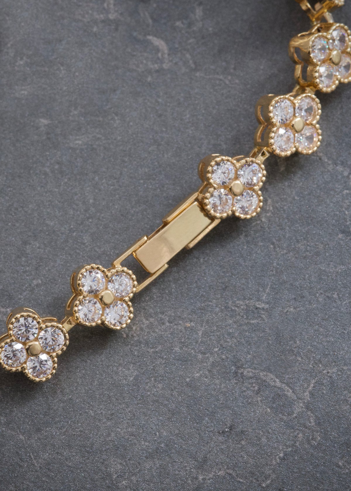 Pulso Flor con Swarovski Blanco 17.8gr / 19cm / 8.7mm — Oro Amarillo