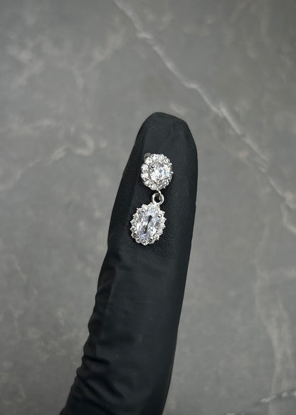 Dije con Swarovskis Blancos 1.1gr / 1.8cm / 6.7mm — Oro Blanco