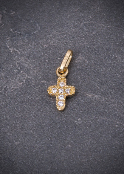 Dije cruz con swarovski blanco 0.4gr / Largo 1.4cm / Oro Amarillo Nac M