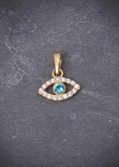 Dije ojo turco con swarovski blanco y azul 0.5gr / Largo 1.2cm / Oro Amarillo Nac P