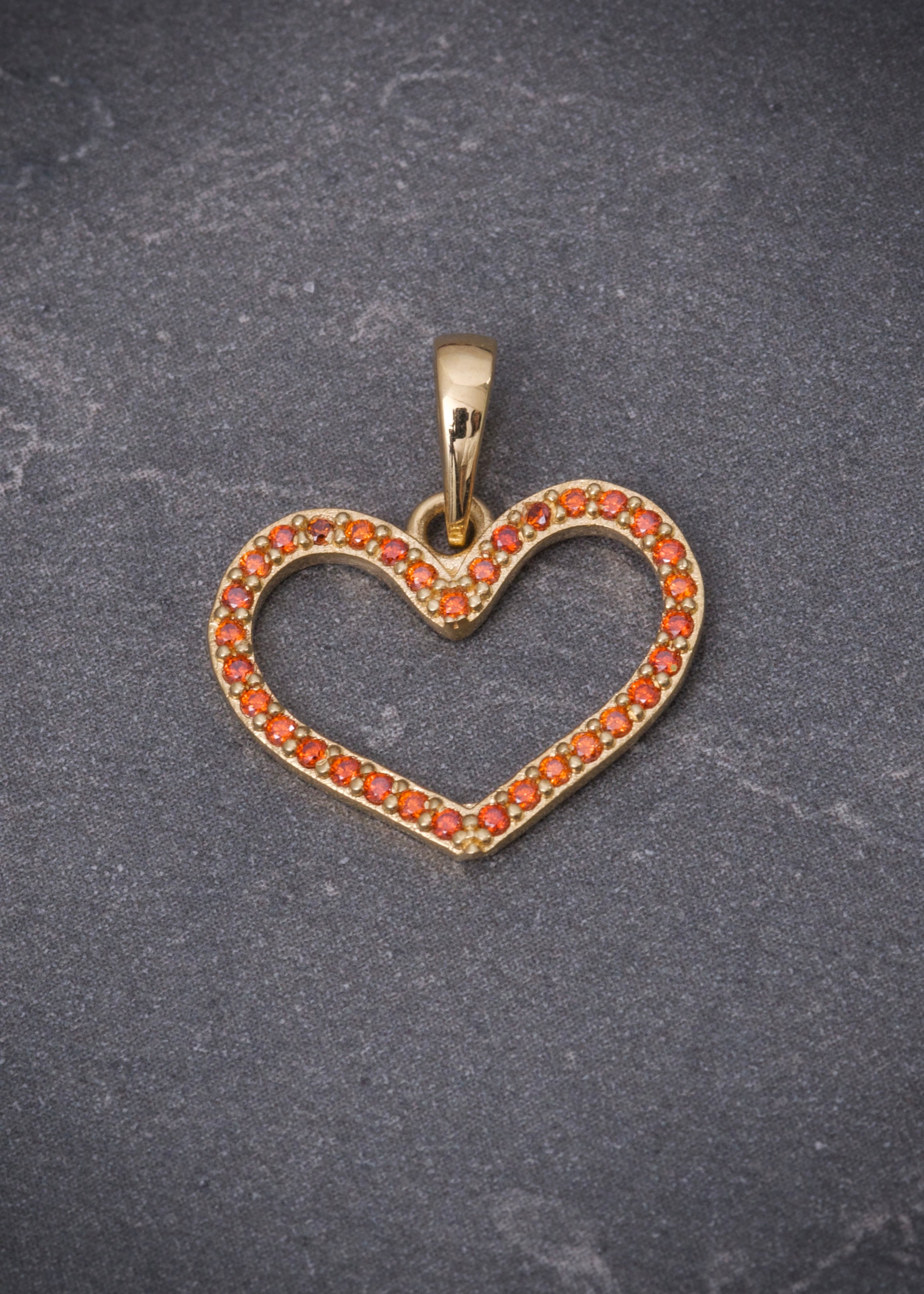 Dije corazon con swarovski naranjado 1.15gr / Largo 1.8cm / Oro Amarillo Nac P