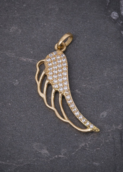 Dije Ala con swarovski blanco 1.6gr / Largo 3cm / Oro Amarillo Nac P