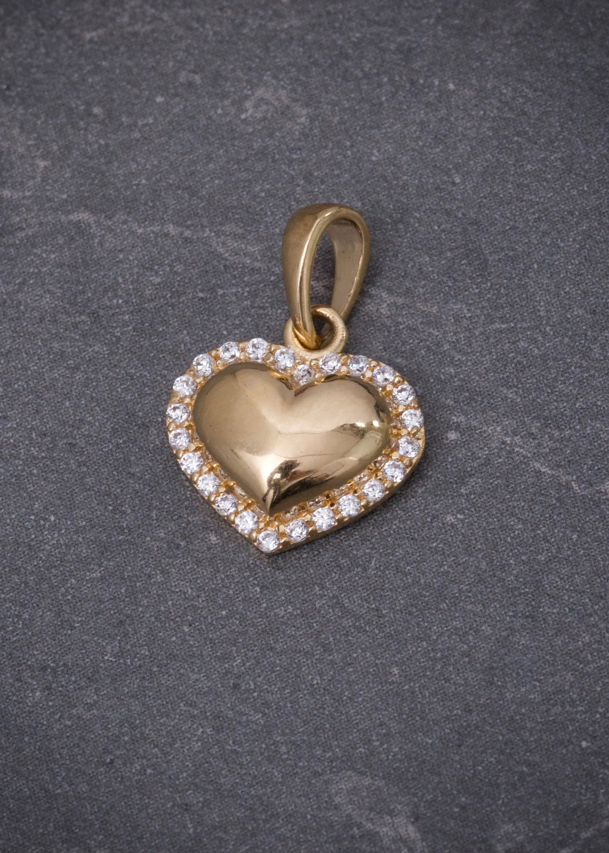 Dije Corazon con swarovski blanco 1.3gr / Largo 1.6cm / Oro Amarillo Nac M