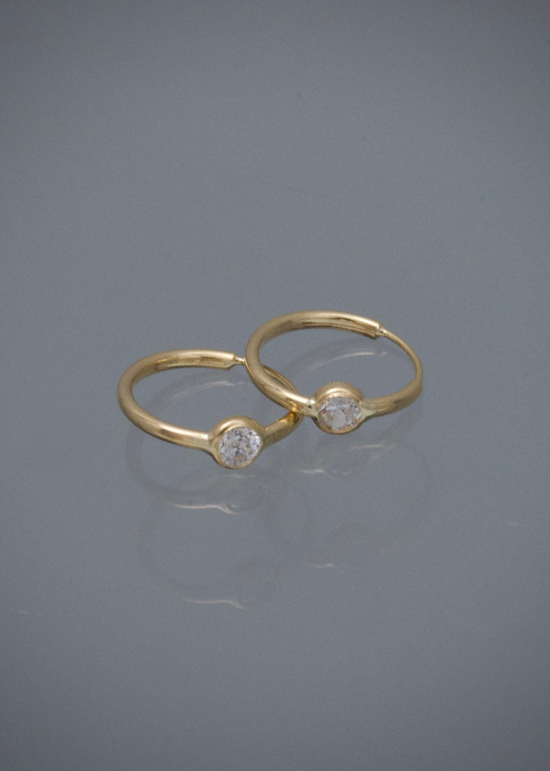 Candongas con Swarovski Blanco 0.55gr / 1.1cm / 3.4mm — Oro Amarillo