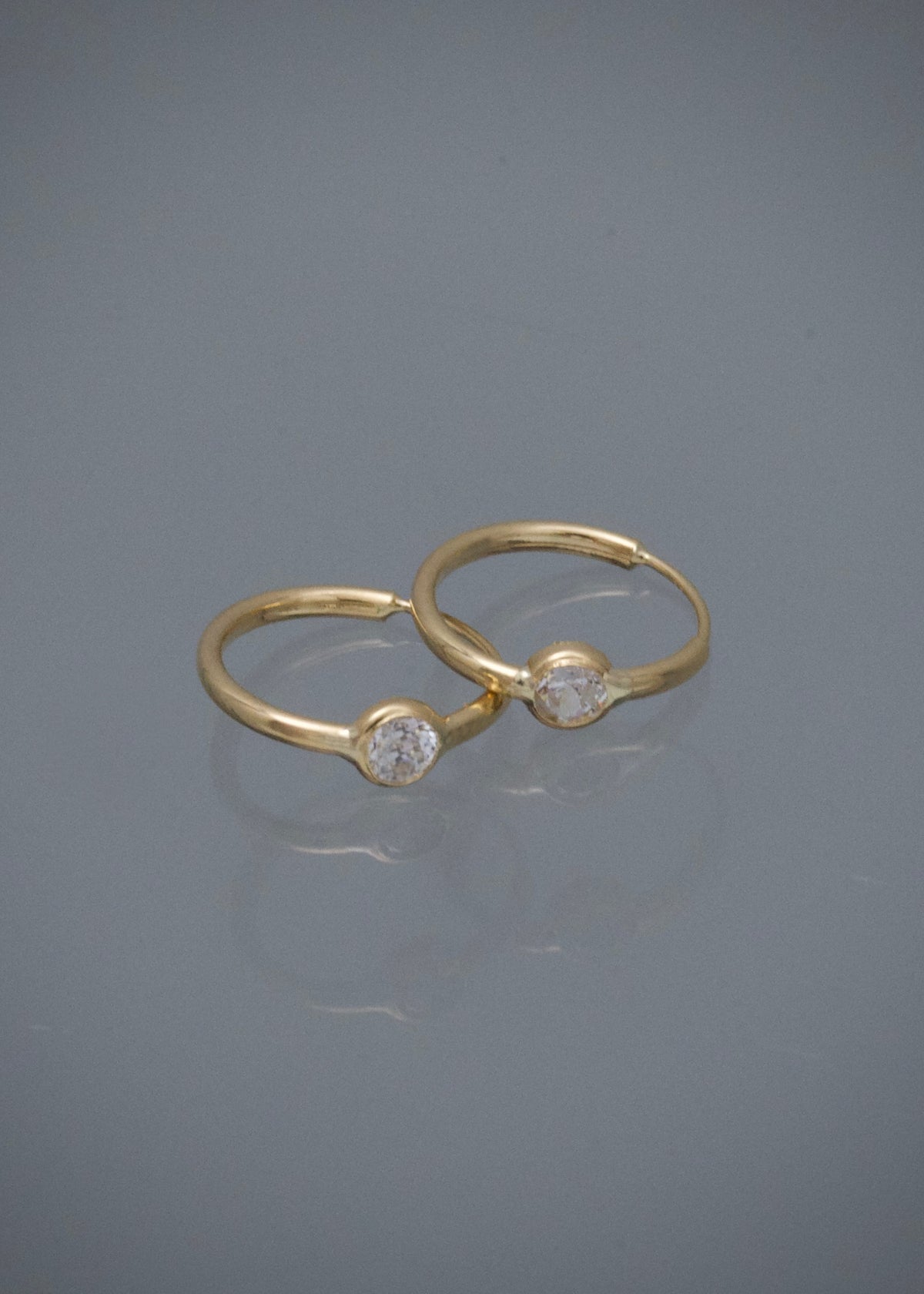 Candongas con Swarovski Blanco 0.55gr / 1.1cm / 3.4mm — Oro Amarillo