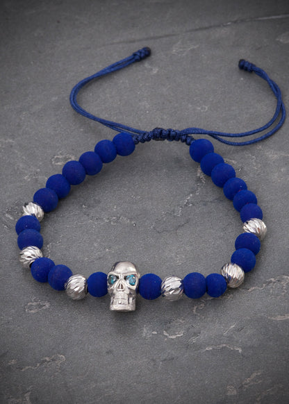 Pulsera en hilo azul con herraje calavera 4.58gr / Oro Blanco (Joya) M